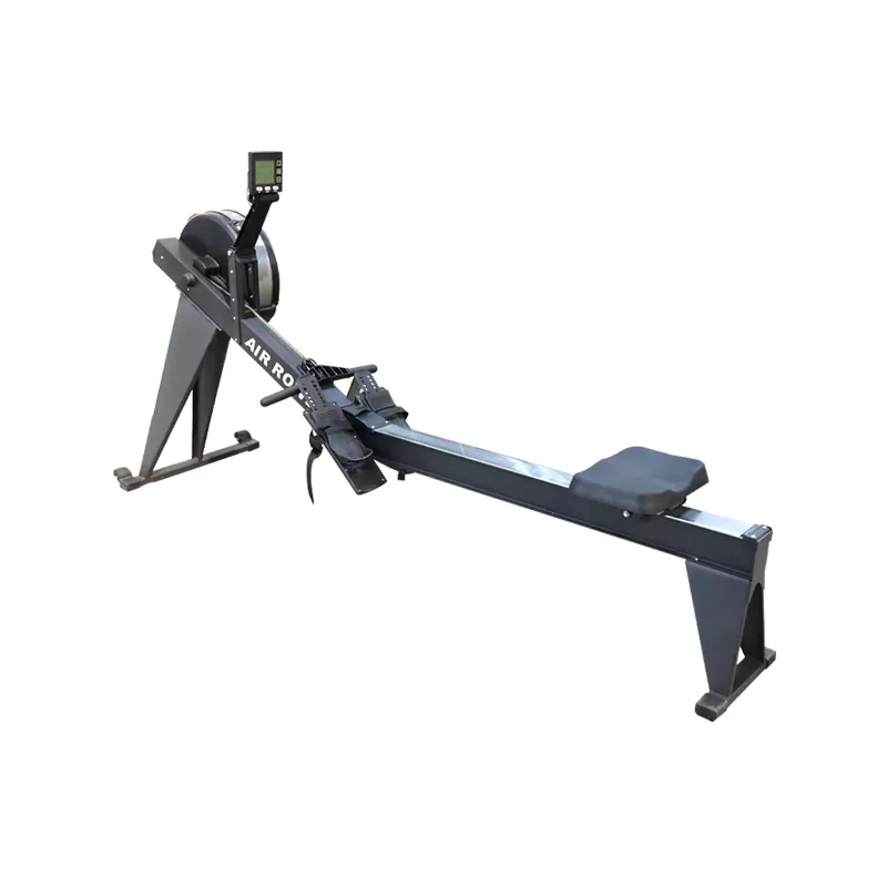 Athlete performing proper rowing stroke technique on commercial rower